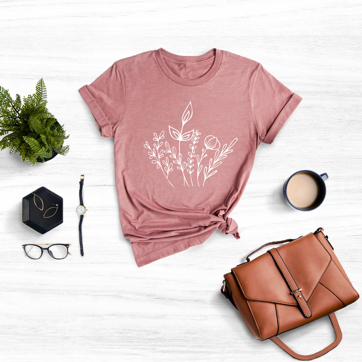 Embrace the beauty of nature with this vibrant "Wild Flowers" t-shirt featuring a colorful wildflower design