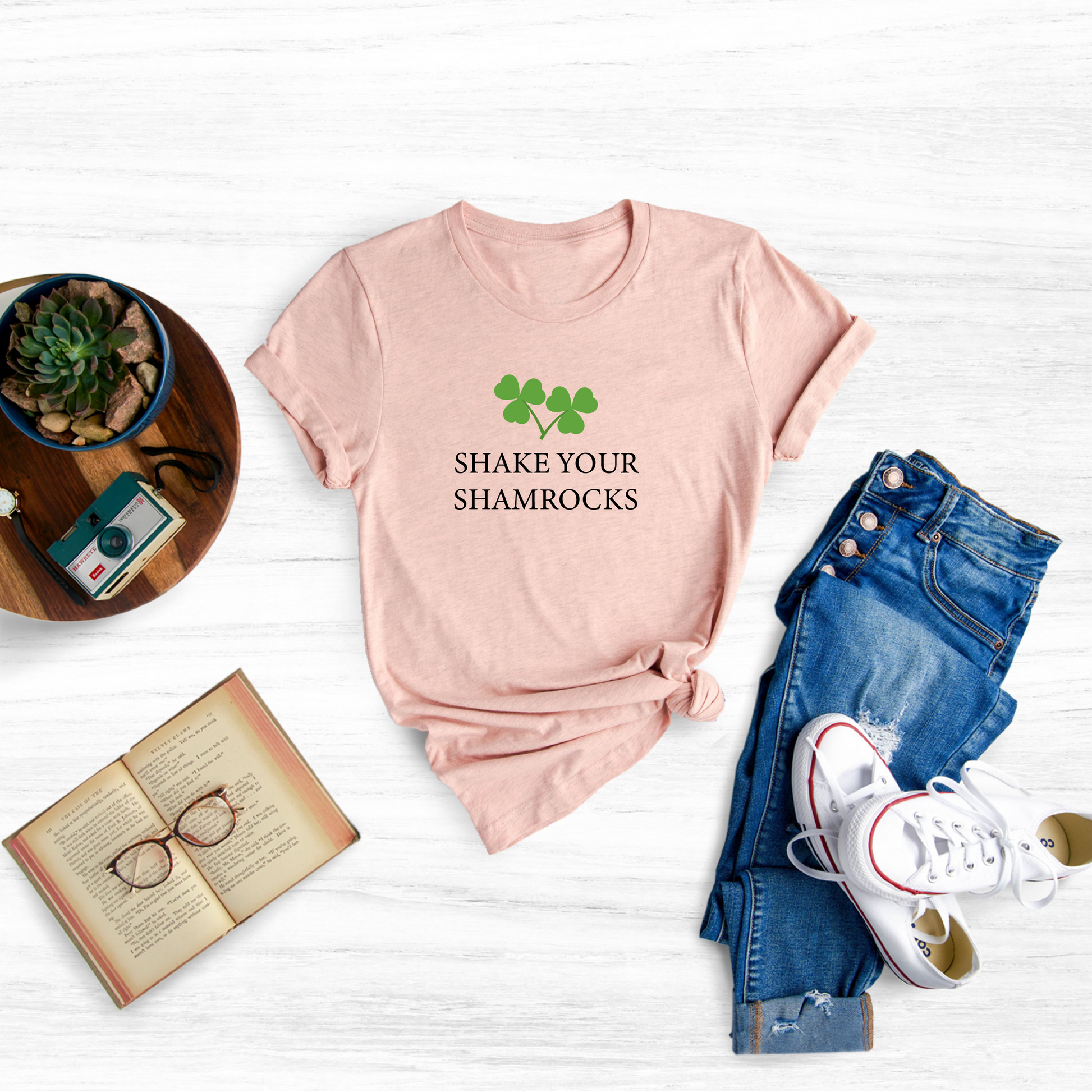 Show off your St. Patrick's Day spirit with this fun "Ladies Shake Your Shamrocks" t-shirt. 