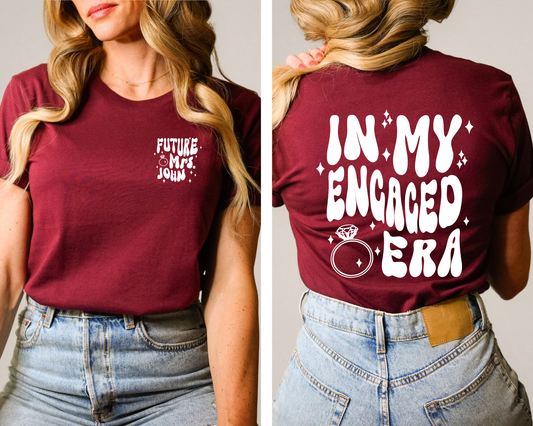 Celebrate the bride-to-be's engagement with our stylish and trendy "In My Engaged Era" T-shirt.
