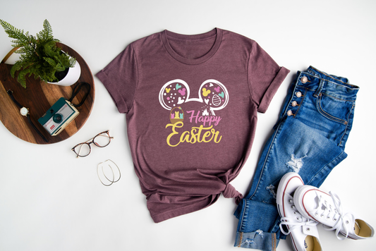 Hop into Easter with a touch of Disney magic and celebrate the joy of the season with our enchanting "Happy Easter" T-shirt!