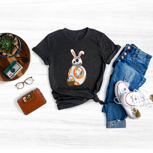 Embrace the Force and add a touch of galactic fun to your Easter celebration with our unique Star Wars Character Easter Eggs T-Shirt! 