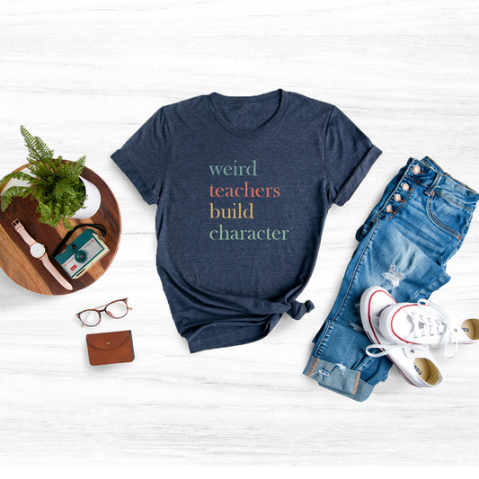 Celebrate the unique and inspiring teachers in your life with our fun and lighthearted "Weird Teachers Build Character" shirt.