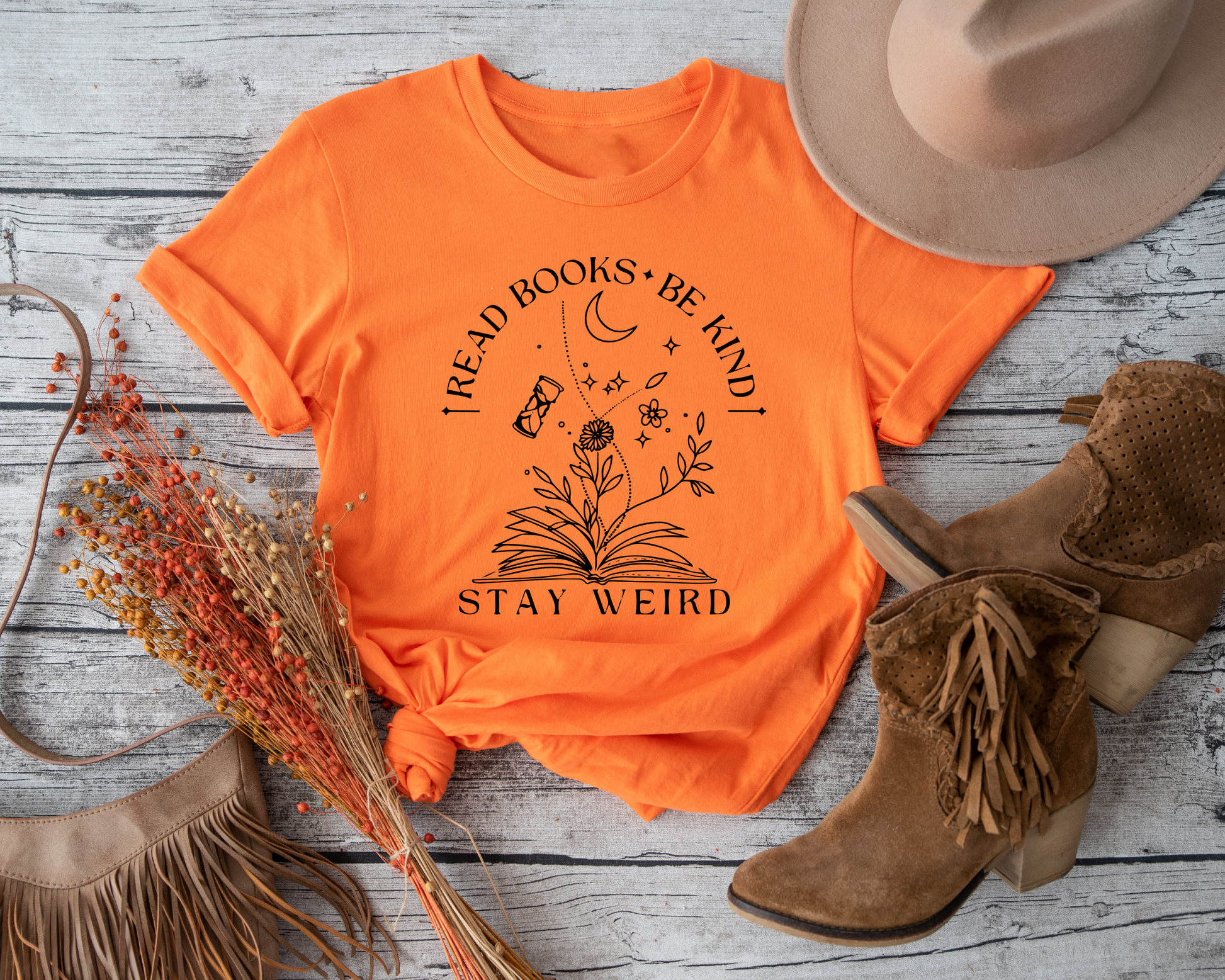 Embrace the power of reading, kindness, and individuality with the inspiring "Read Books Be Kind Stay Weird Shirt, Teacher Shirt"