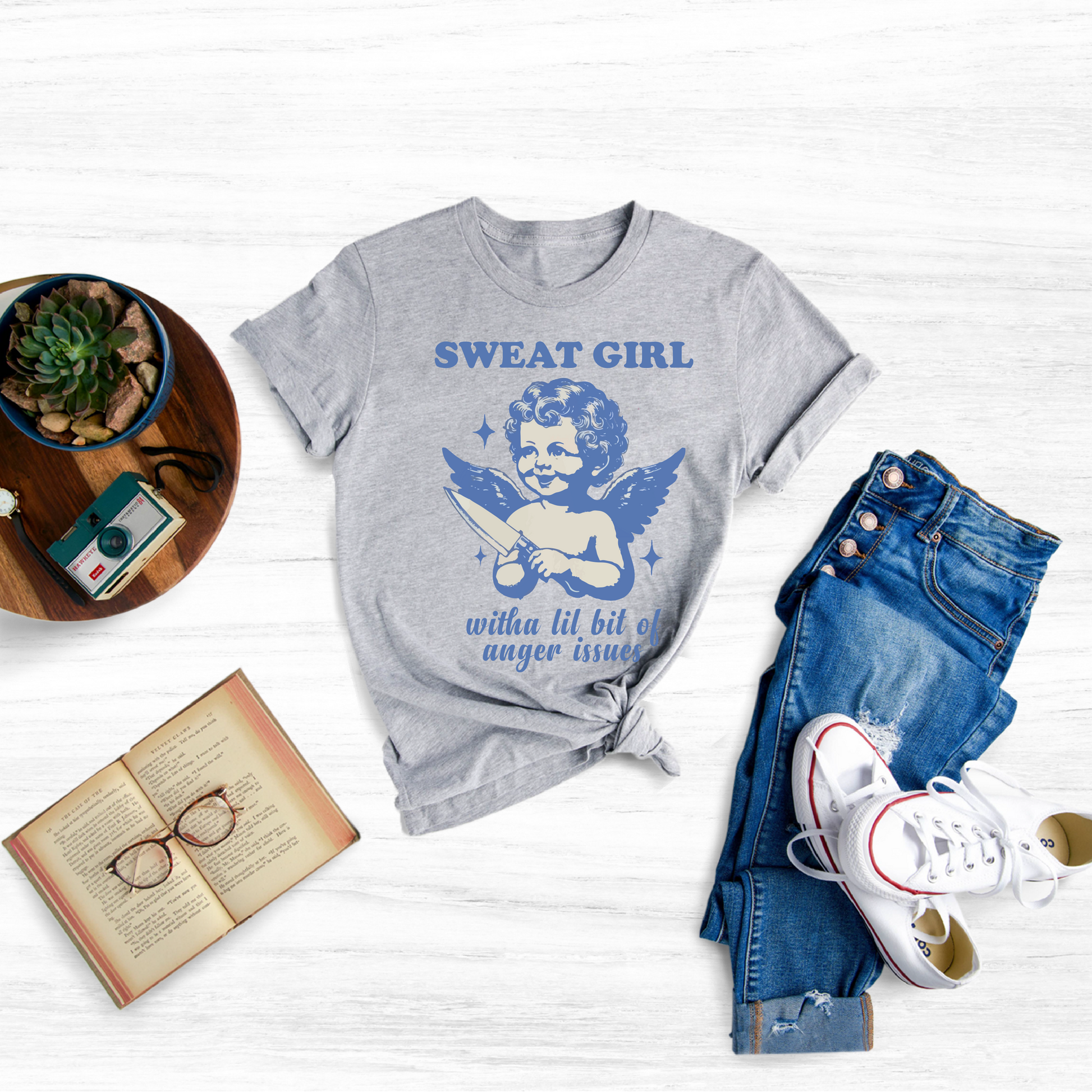 Embrace the duality of sweetness and strength with our Sweet Girls With Anger Issues Graphic T-Shirt, a bold and stylish statement piece that captures the complex nature of femininity.