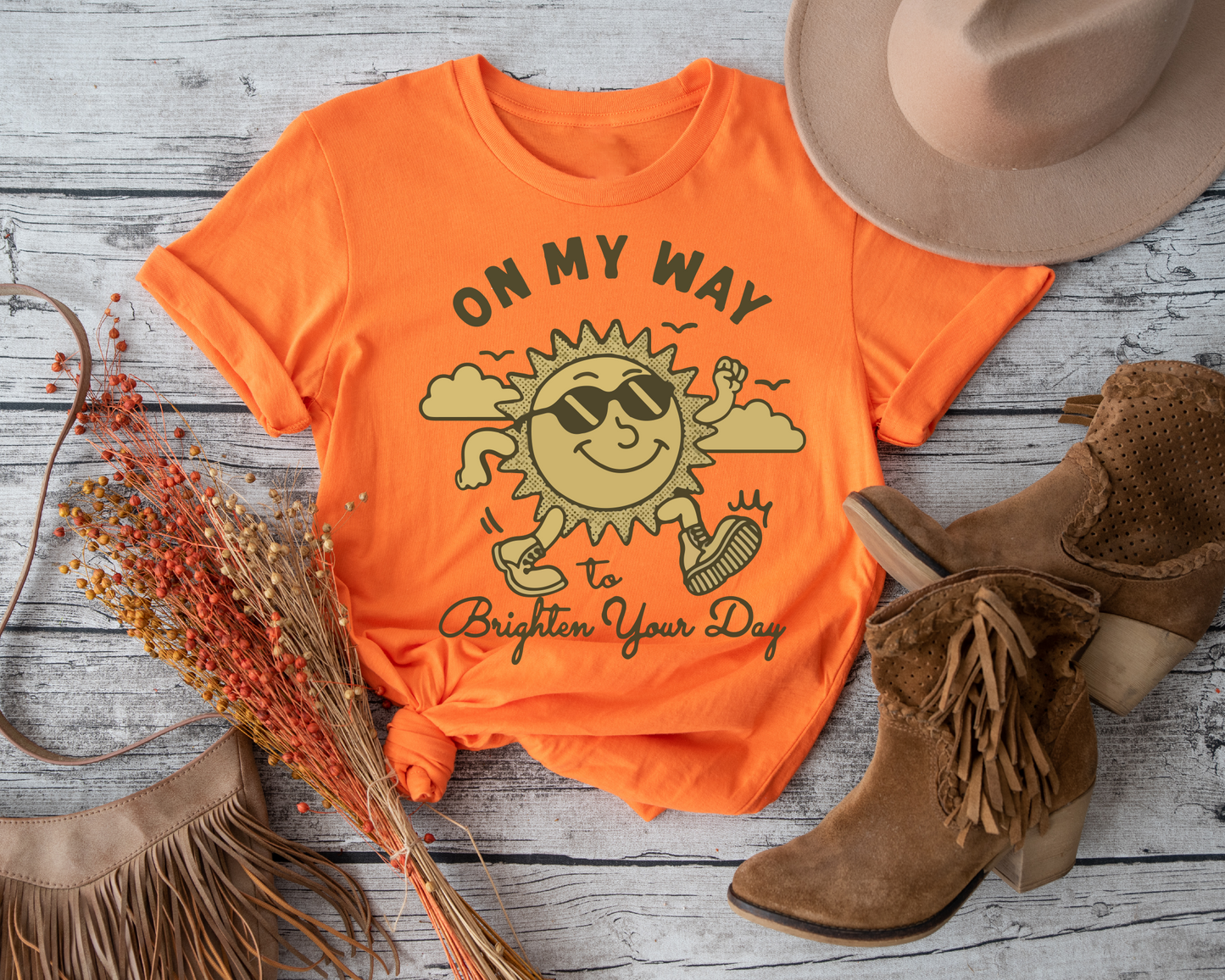 Spread a little sunshine wherever you go with our "Shirt On My Way To Brighten Your Day" T-Shirt, the perfect way to add a touch of positivity and cheer to your everyday wardrobe.