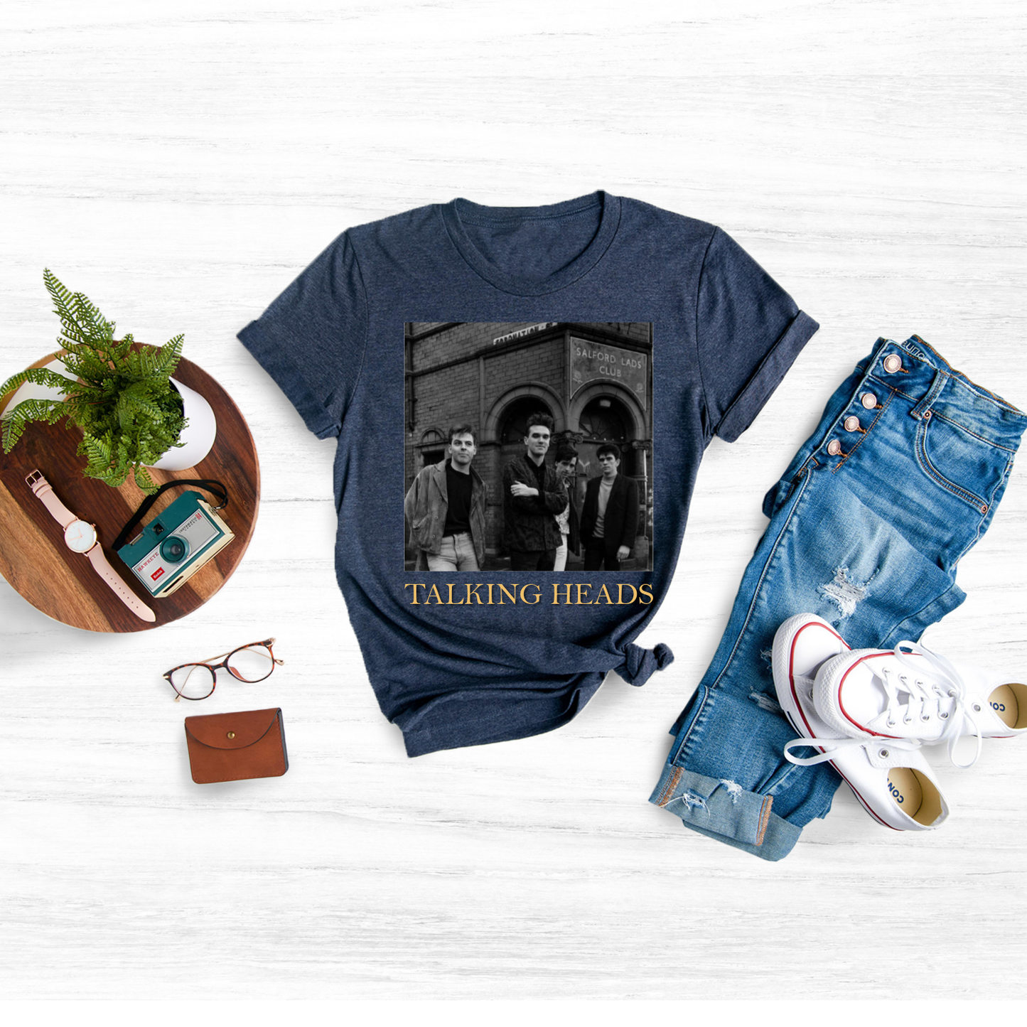 Pay homage to the iconic British indie rock band The Smiths with our vintage-inspired The Smiths Unisex T-Shirt, the perfect way to show off your love for their timeless music and unique style.