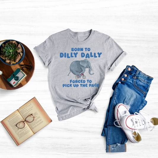 Embrace the art of procrastination and celebrate the beauty of taking it slow with our "Born To Dilly Dally" Graphic T-Shirt, the perfect way to express your laid-back attitude and appreciation for the simple pleasures of life.