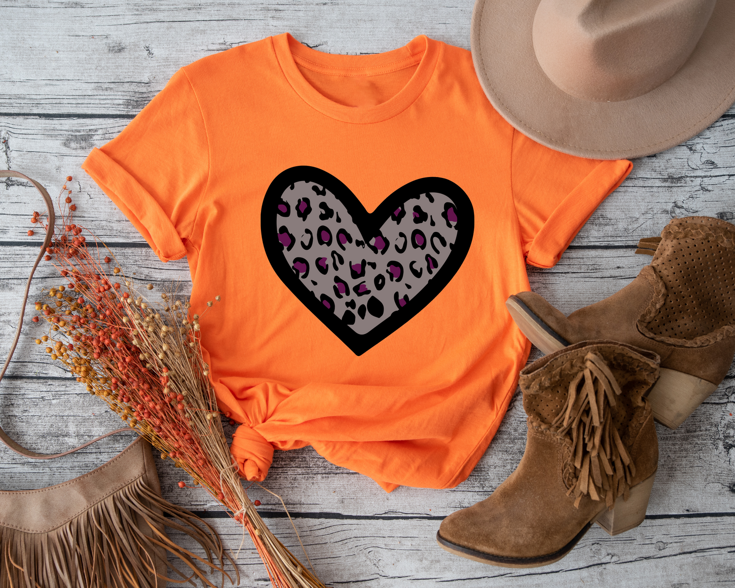 Embrace your fierce side and celebrate love with this unique leopard print Valentine's Day tee. 