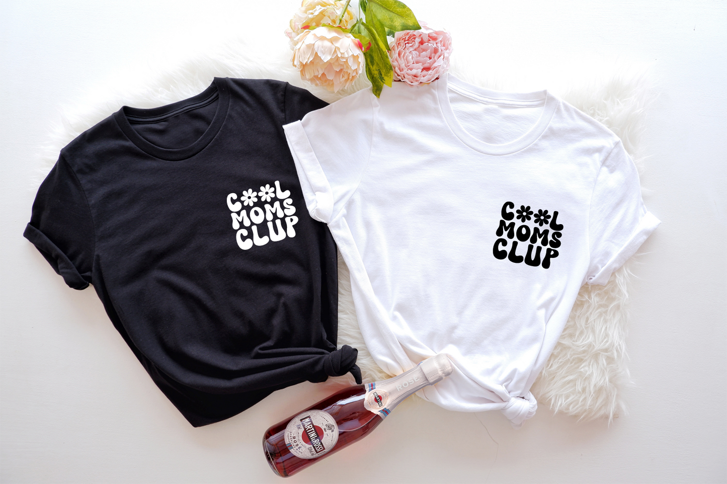 Graphic tee featuring a trendy 'Cool Moms Club' design for fun-loving and supportive moms.
