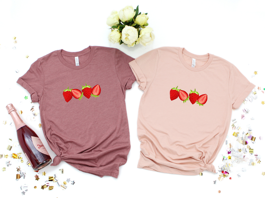Delight in the sweetness of summer with this charming embroidered strawberry tee on soft Comfort Colors fabric.